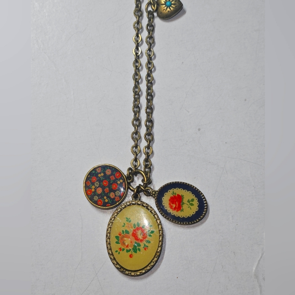 VINTAGE CATH KIDSTON BRASS FLORAL CHARM NECKLACE
